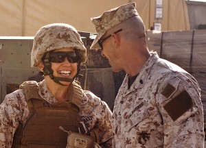 U.S. Navy Rear Adm. Margaret Kibben, left, chaplain of the Marine Corps, speaks to Chief Warrant Officer 2 Rodger Turner at Forward Operating Base Delhi, Afghanistan, Sept. 22, 2011. Turner is a gunner with 1st Battalion, 3rd Marine Regiment. (U.S. Marine Corps photo by Cpl. Colby Brown/Released)
