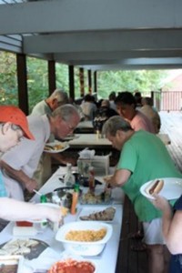 The Church of the Mountain gathers for a Thursday evening hiker’s pot luck feast that the church offers from June through August. The church feeds up to 50-60 at this dinner.