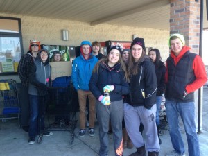 Cold and hungry youth stand outside in search of food to donate to local food banks.